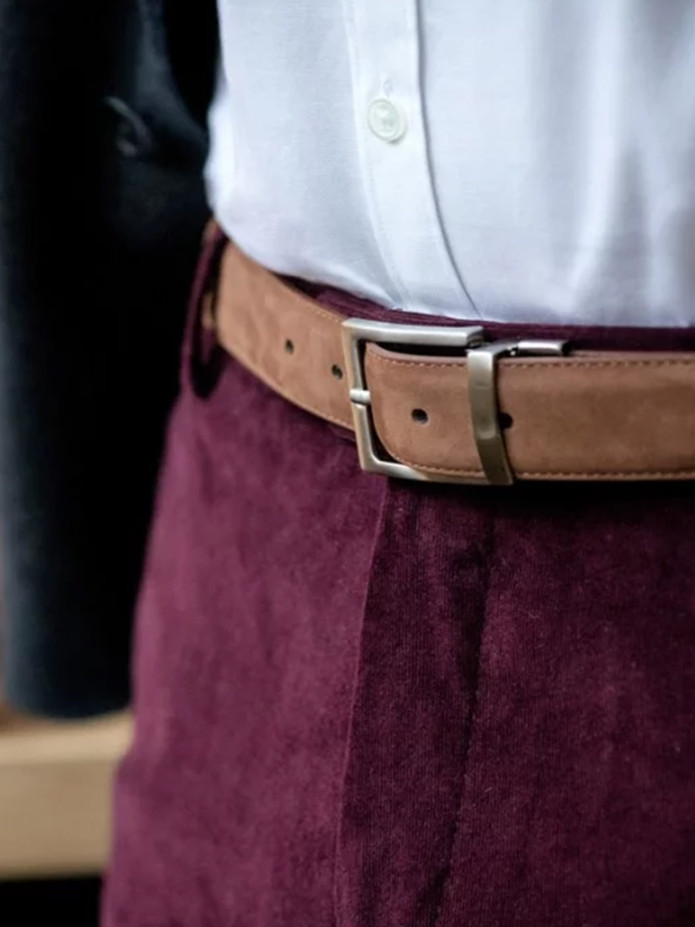 Omkeerbare bruine riem leer en nubuck